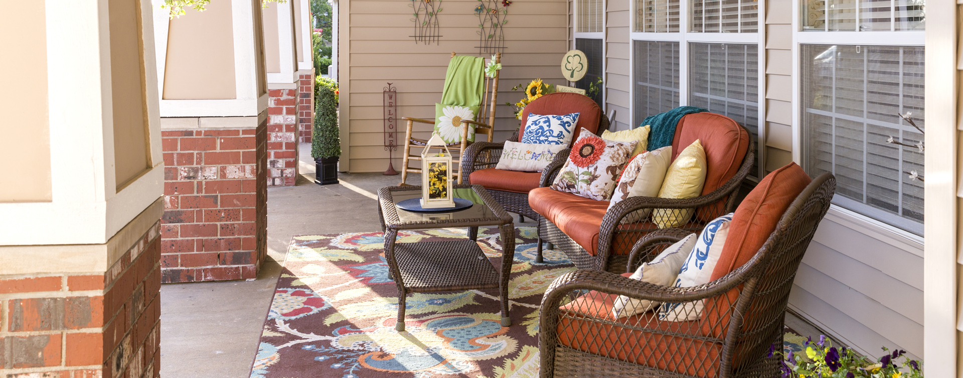 Relax in your favorite chair on the porch at Bickford of Omaha - Hickory