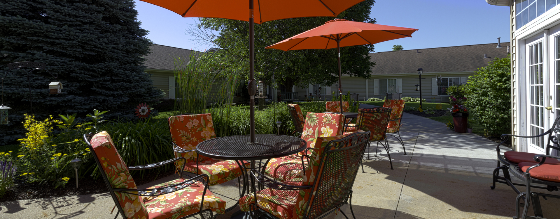 Enjoy the outdoors in a whole new light by stepping into our secure courtyard at Bickford of Omaha - Hickory