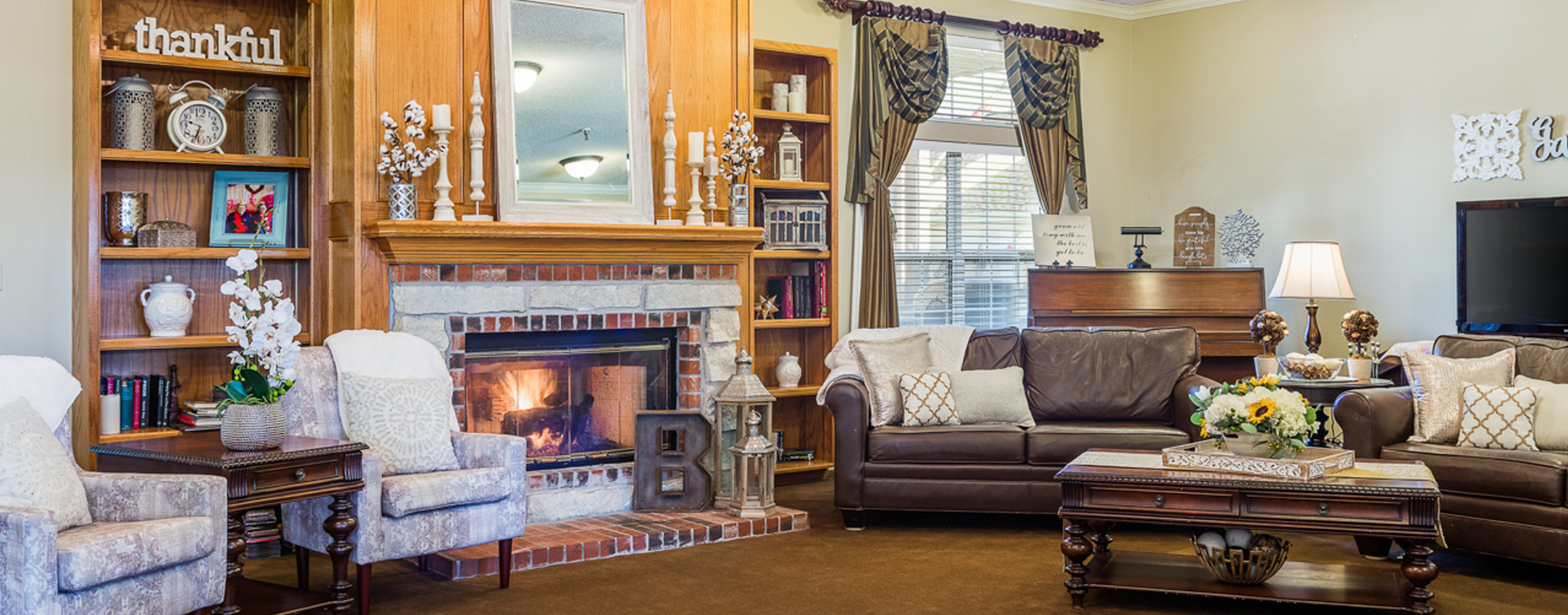 Enjoy a good book in the living room at Bickford of Ames
