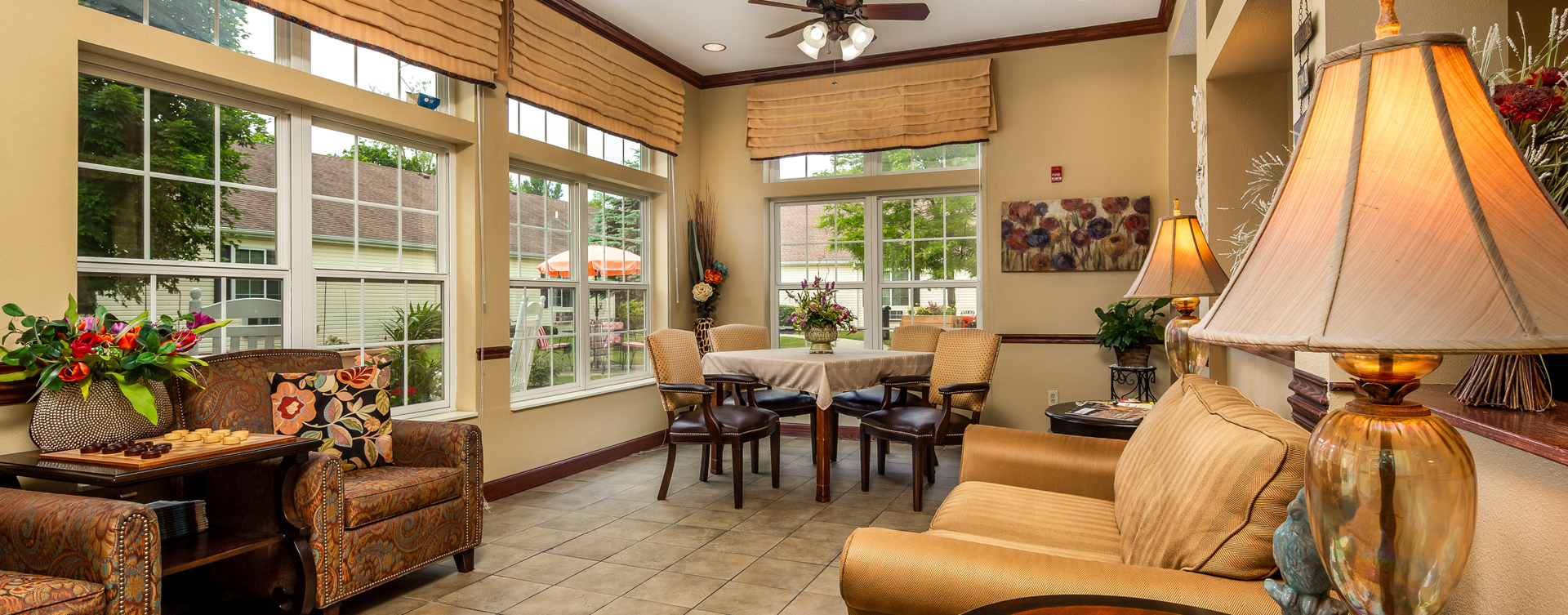 Relax in the warmth of the sunroom at Bickford of Battle Creek
