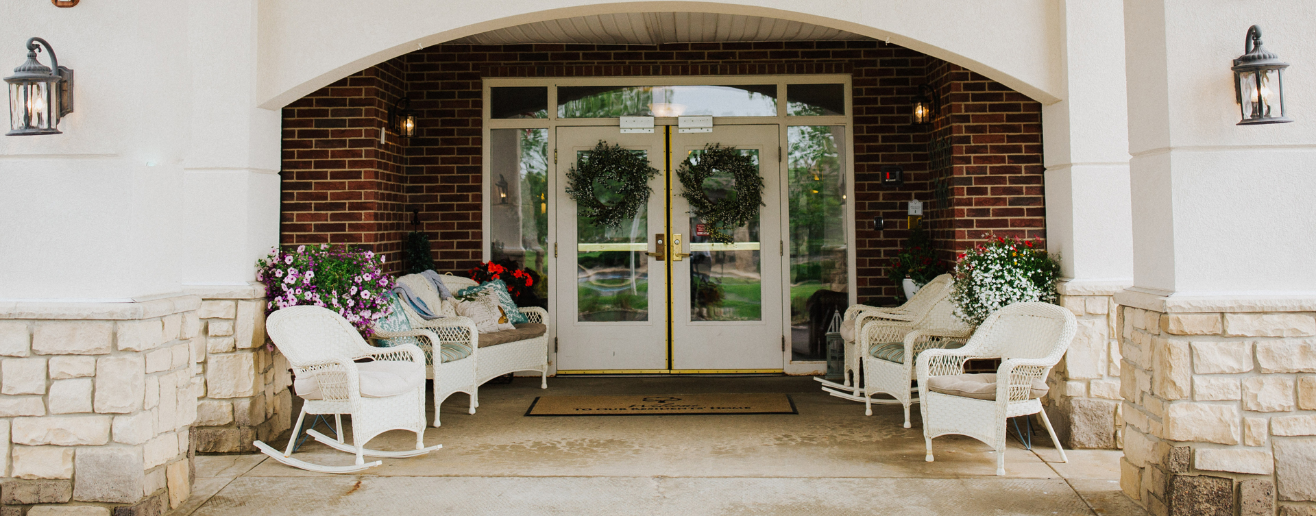 Sip on your favorite drink on the porch at Bickford of Bourbonnais