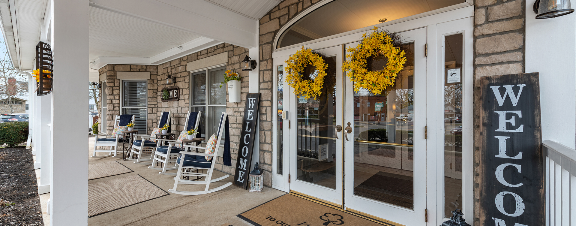 Enjoy conversations with friends on the porch at Bickford of Bexley
