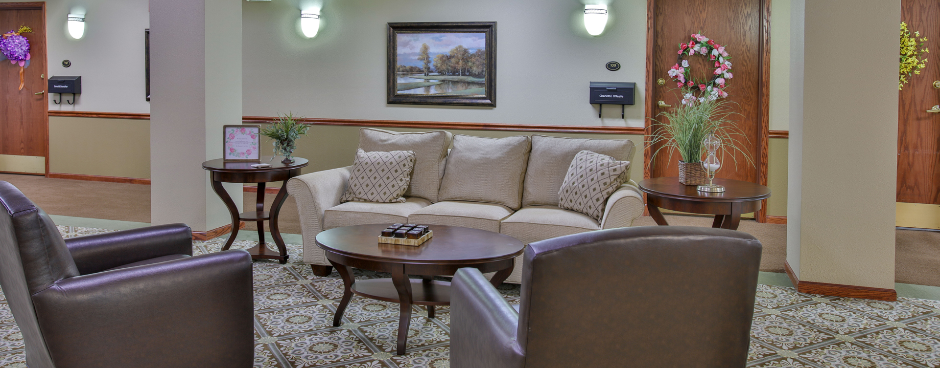 Socialize with friends in the living room at Bickford of Bloomington