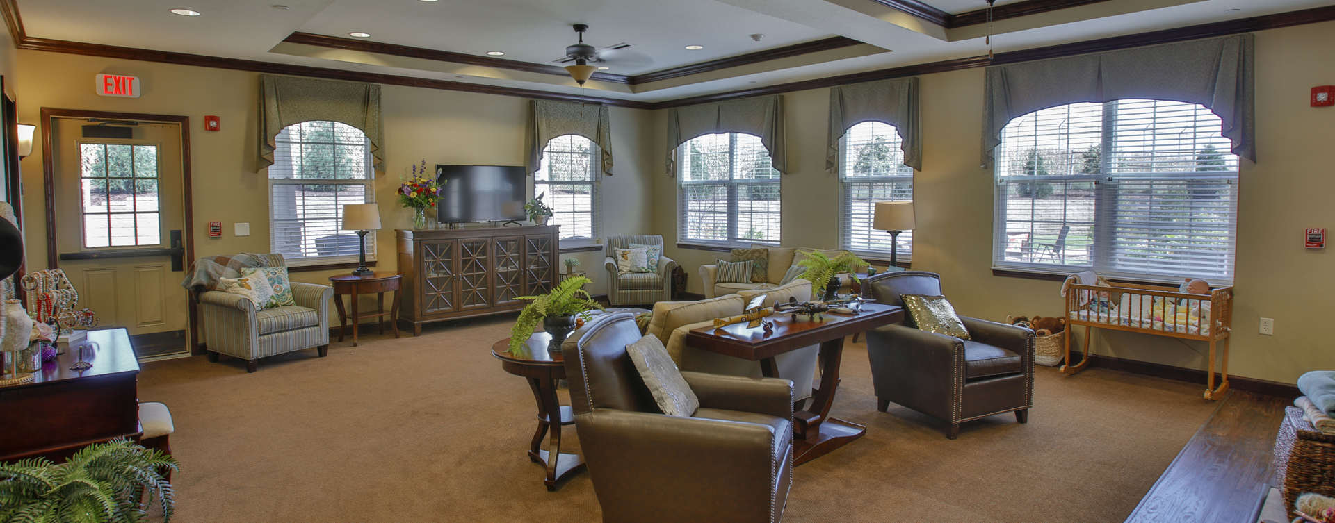Chairs and sofas sit higher and are easier to get in and out of in the Mary B’s living room at Bickford of Bloomington