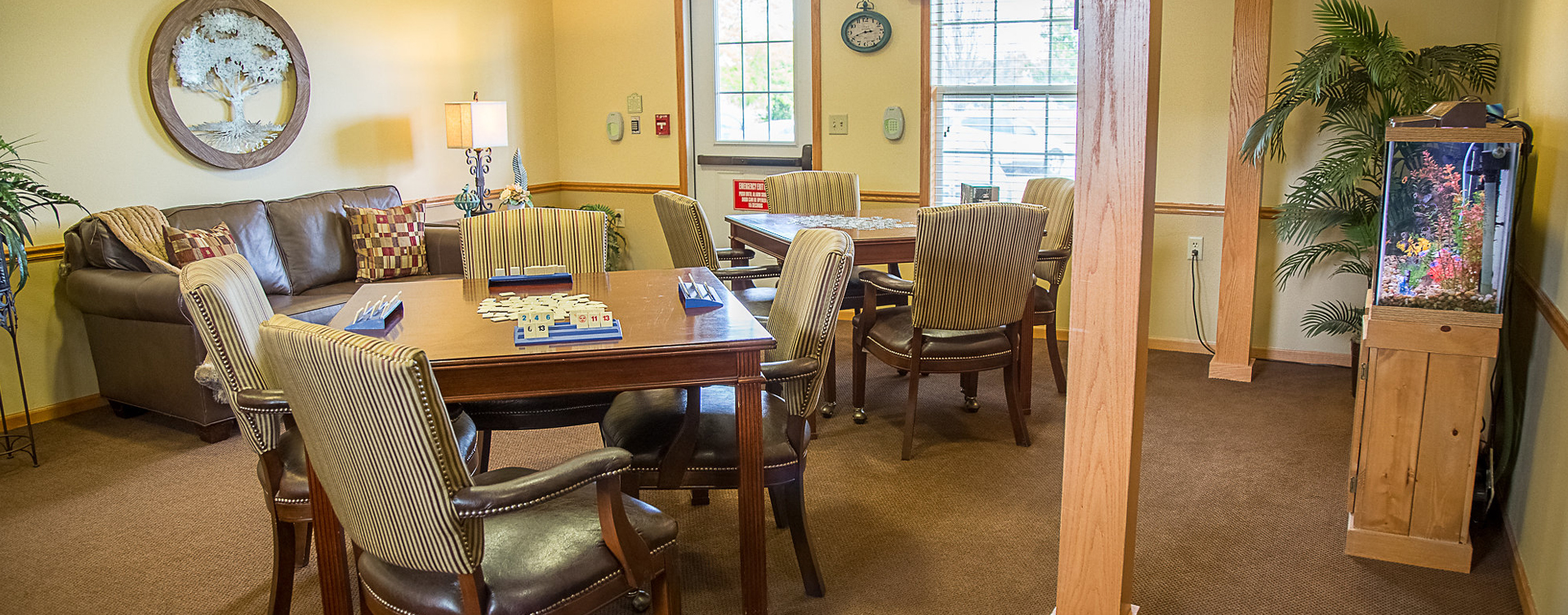 Relax with a good puzzle in the activity room at Bickford of Burlington