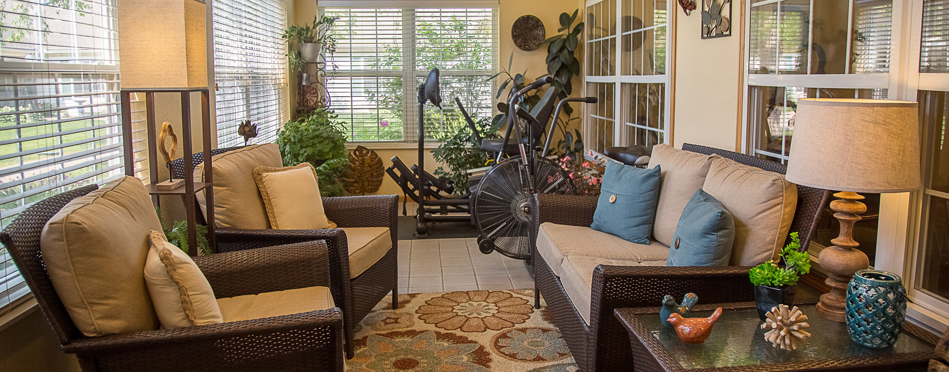 Enjoy the view of the outdoors from the sunroom at Bickford of Burlington
