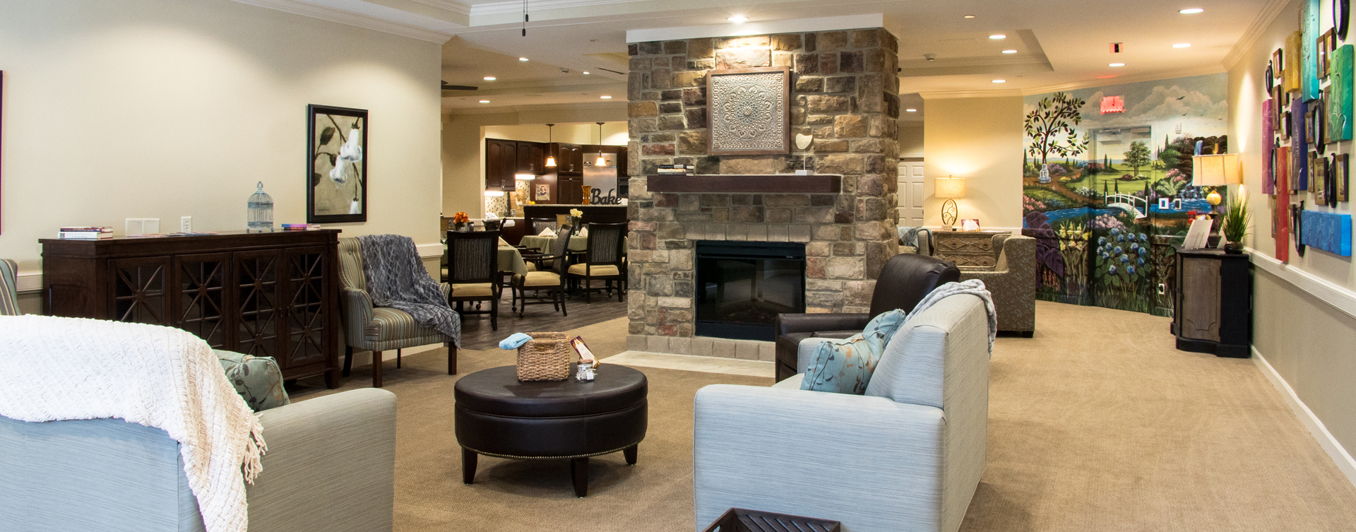 Residents can enjoy furniture covered in cozy fabrics in the Mary B’s living room at Bickford of Chesterfield