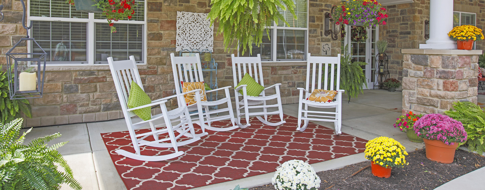 Sip on your favorite drink on the porch at Bickford of Carmel
