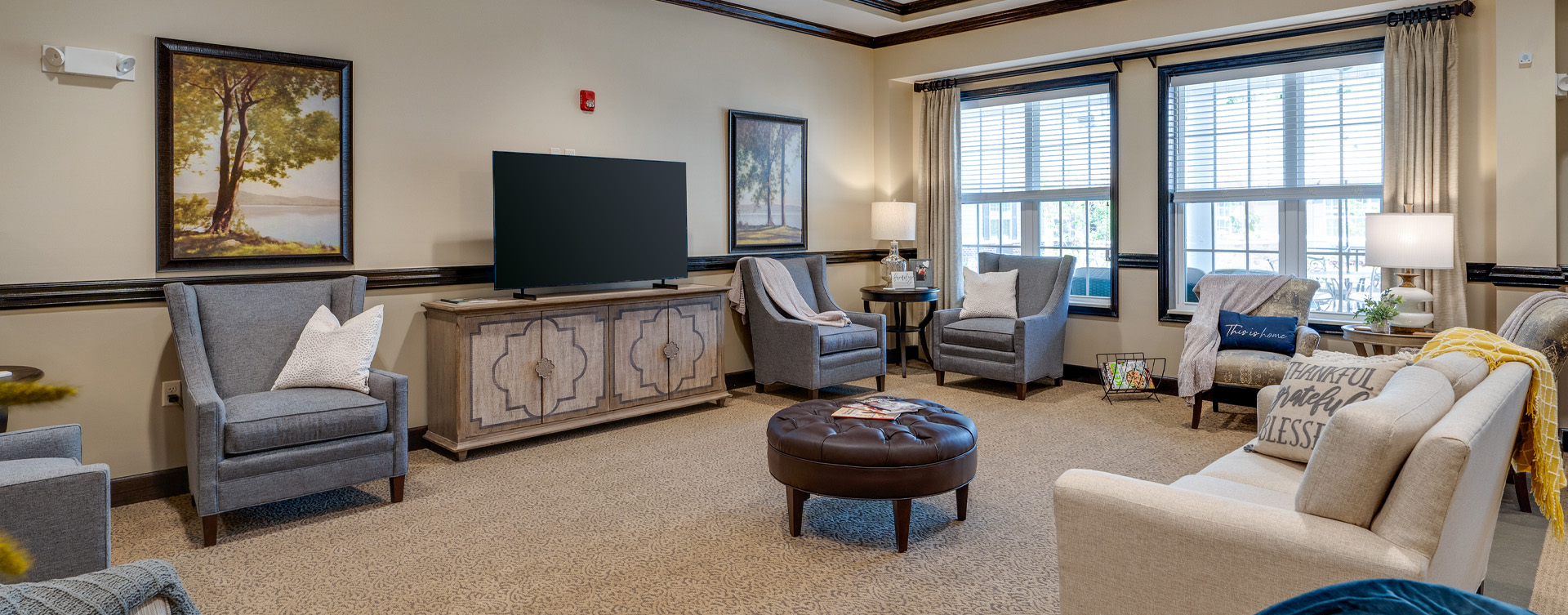 Socialize with friends in the living room at Bickford of Chesapeake