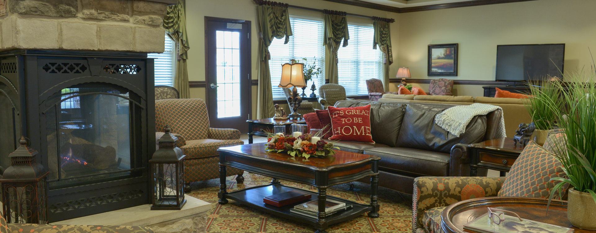 Enjoy a good book in the living room at Bickford of Crown Point