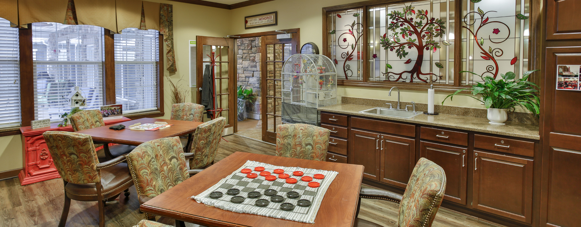 Enjoy a good card game with friends in the activity room at Bickford of Crown Point