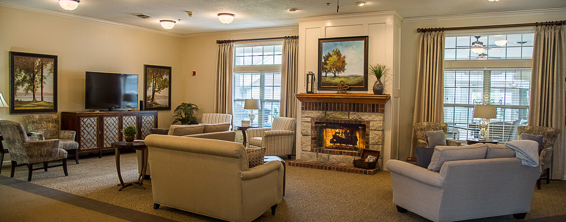 Enjoy a good book in the living room at Bickford of Davenport
