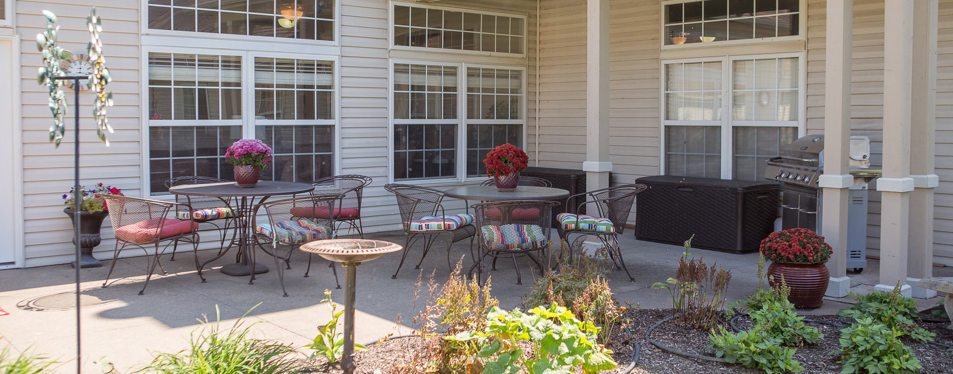 Enjoy bird watching, gardening and barbecuing in our courtyard at Bickford of Davenport