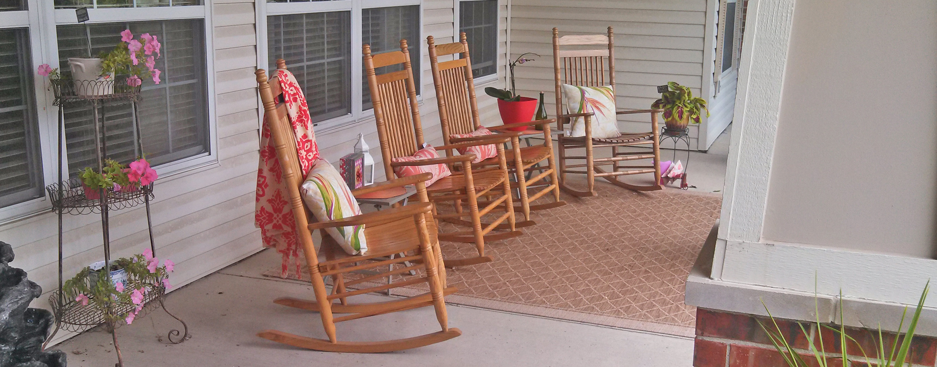 Enjoy conversations with friends on the porch at Bickford of Fort Dodge