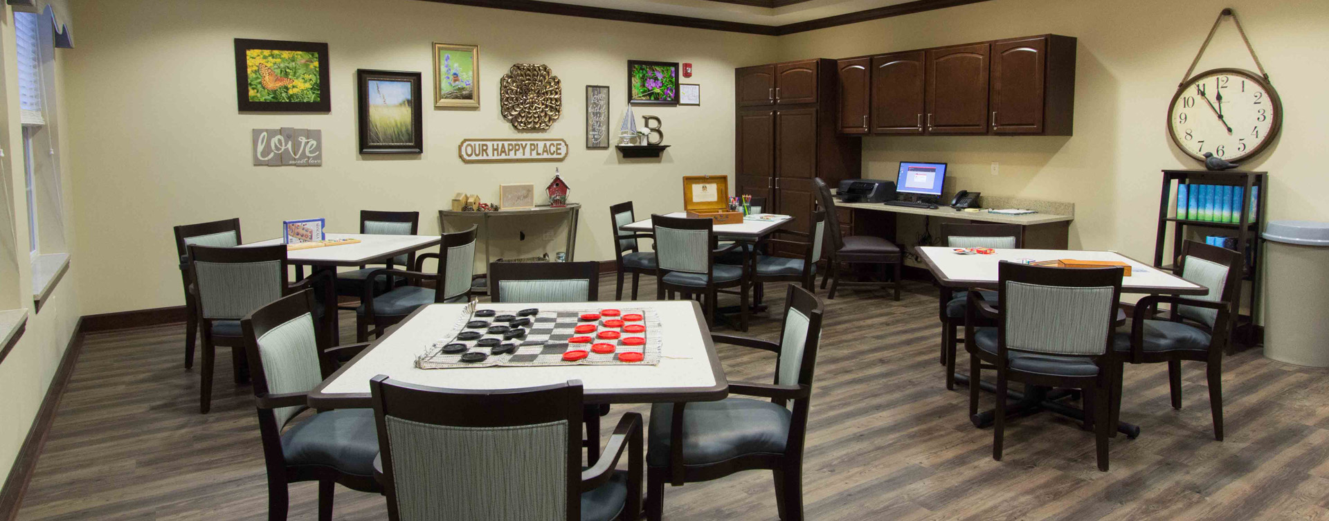 Enjoy a good card game with friends in the activity room at Bickford of Gurnee