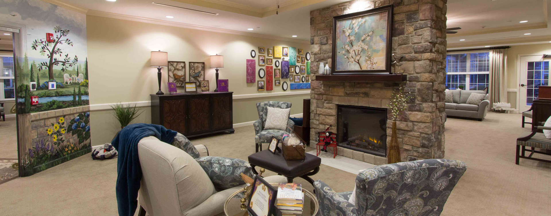 Chairs and sofas sit higher and are easier to get in and out of in the Mary B’s living room at Bickford of Gurnee