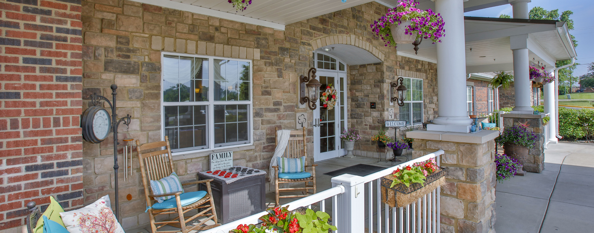 Enjoy conversations with friends on the porch at Bickford of Greenwood