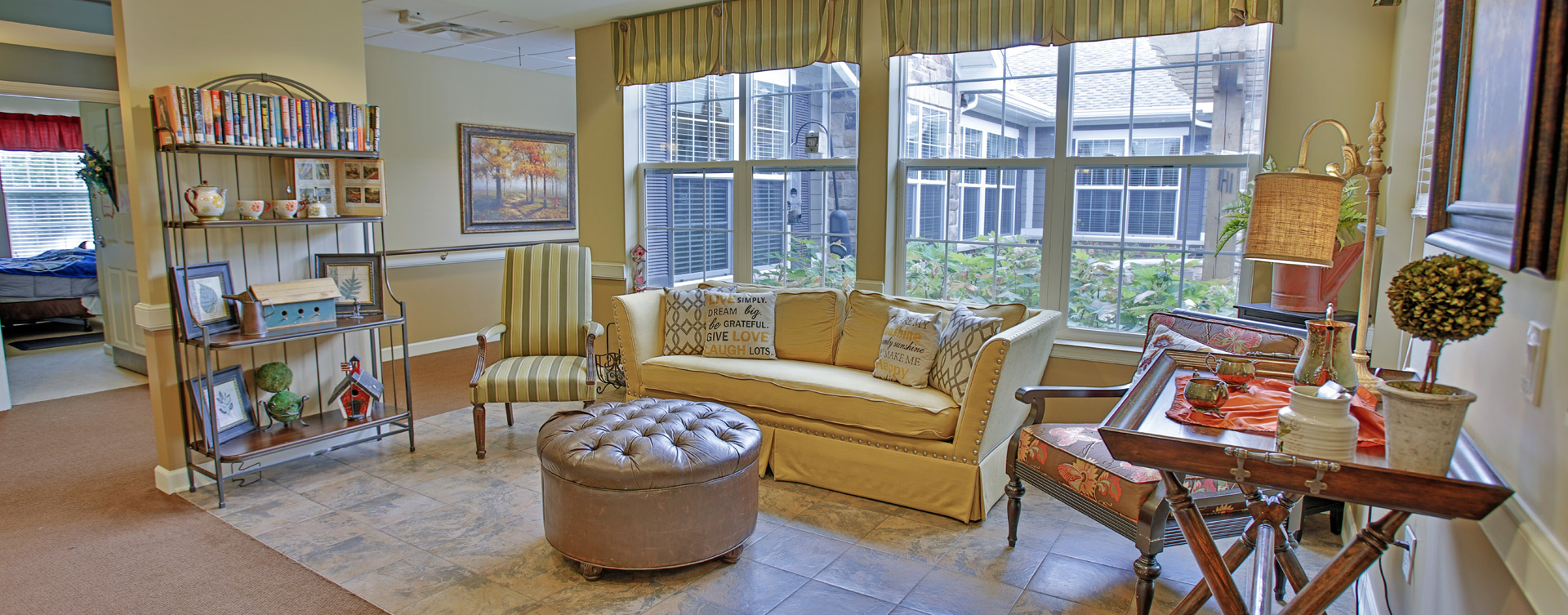 Relax in the warmth of the sunroom at Bickford of Greenwood