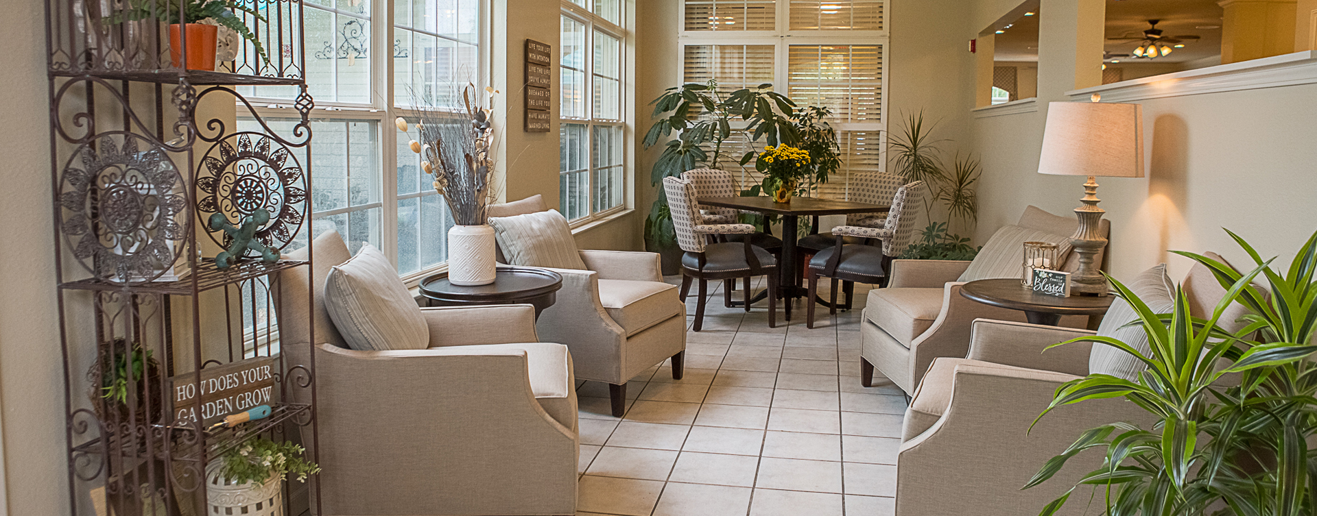 Relax in the warmth of the sunroom at Bickford of Iowa City