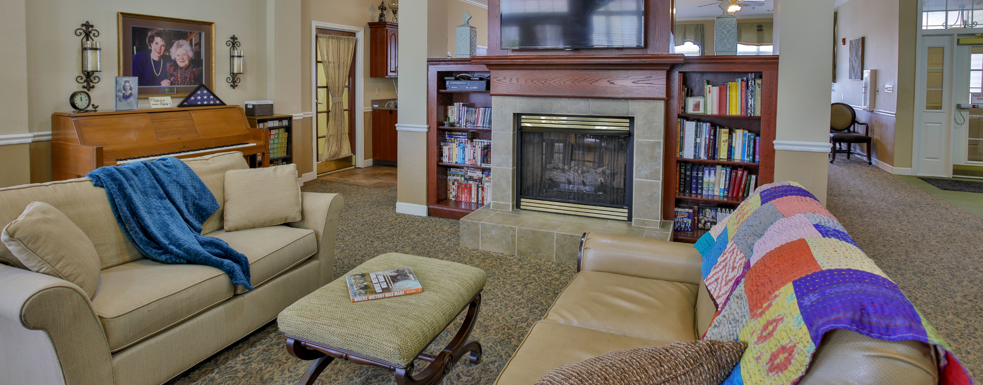 Enjoy a good book in the living room at Bickford of Lafayette