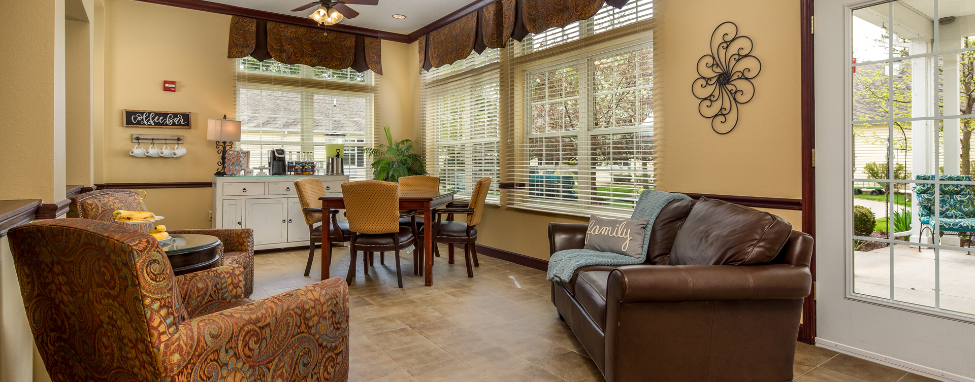 Relax in the warmth of the sunroom at Bickford of Okemos