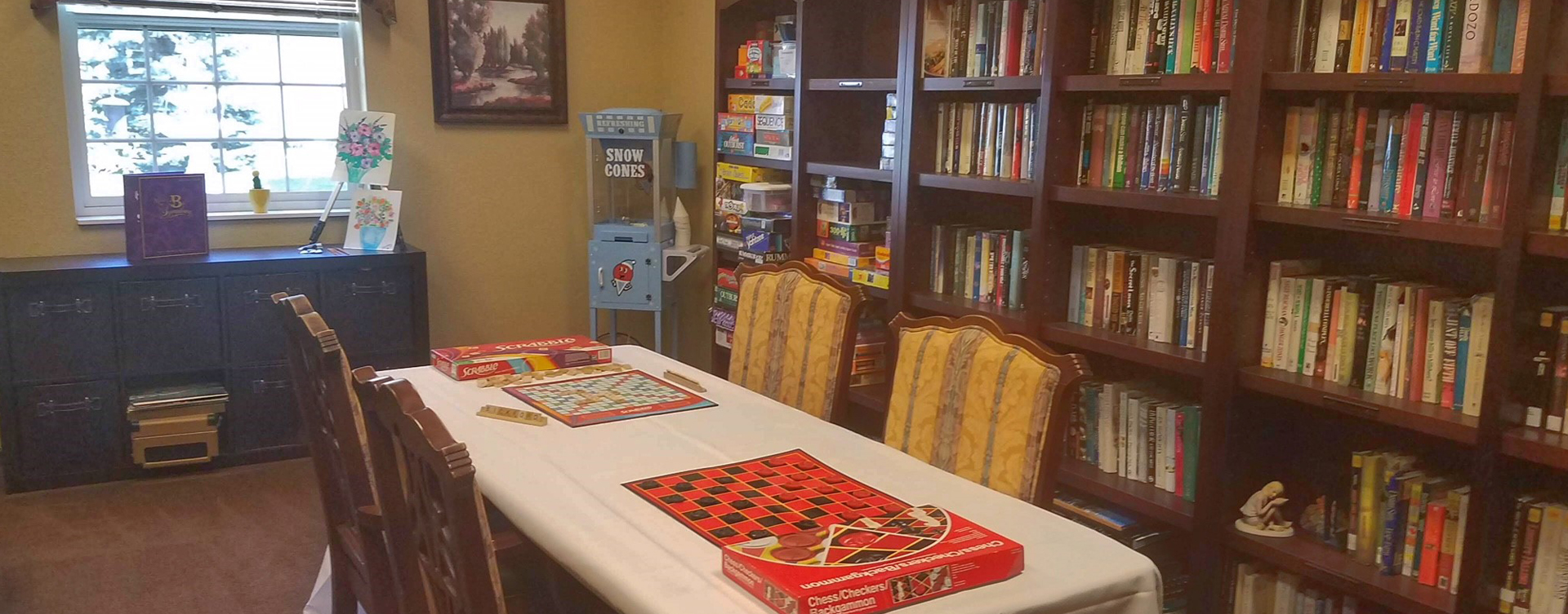 Enjoy a good card game with friends in the activity room at Bickford of Okemos