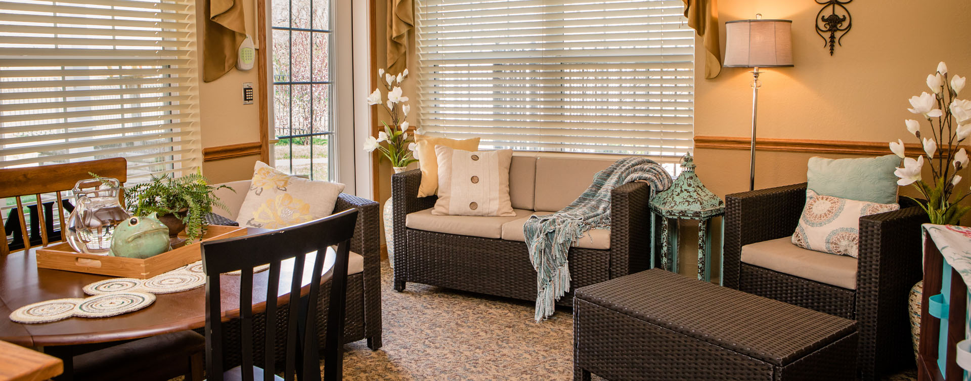 Enjoy the view of the outdoors from the sunroom at Bickford of Macomb