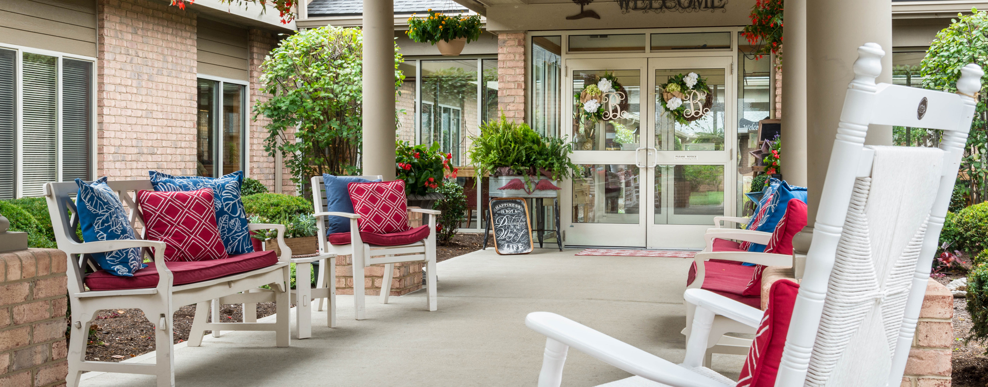 Enjoy conversations with friends on the porch at Bickford of Middletown