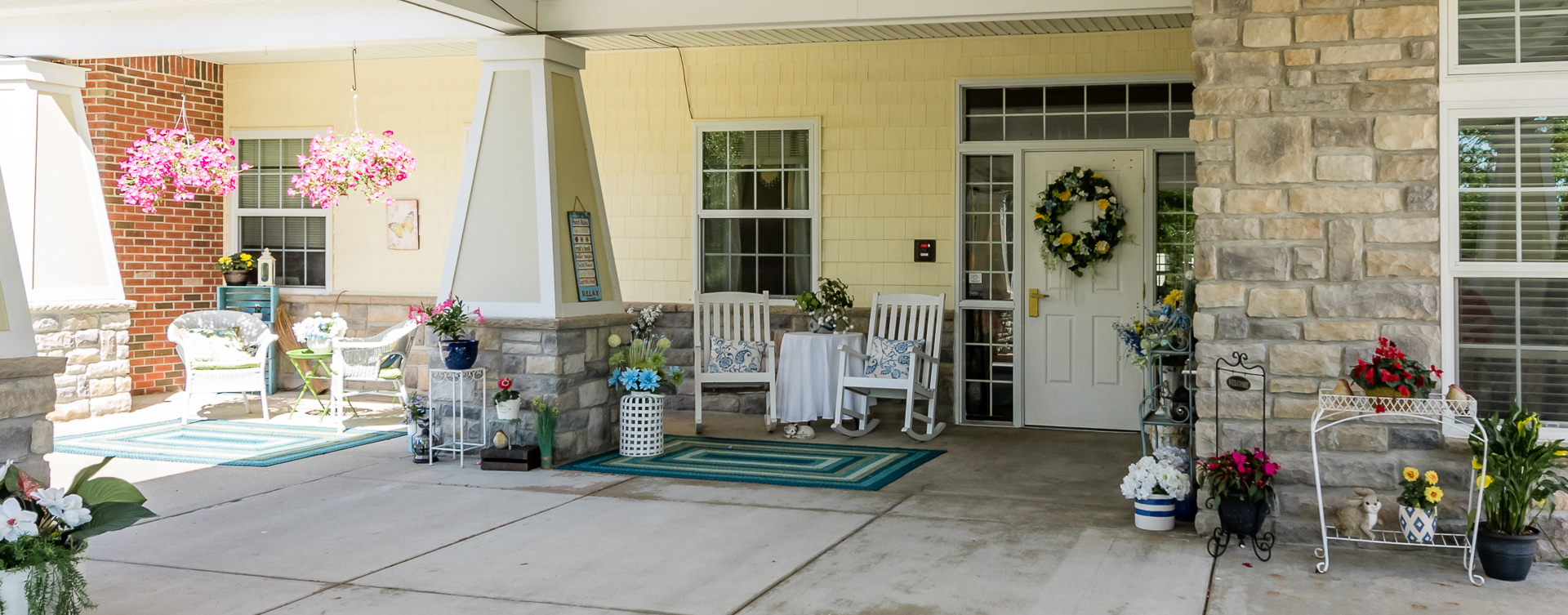 Enjoy conversations with friends on the porch at Bickford of Midland
