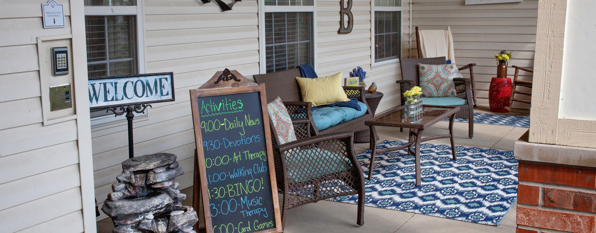 Enjoy conversations with friends on the porch at Bickford of Marion