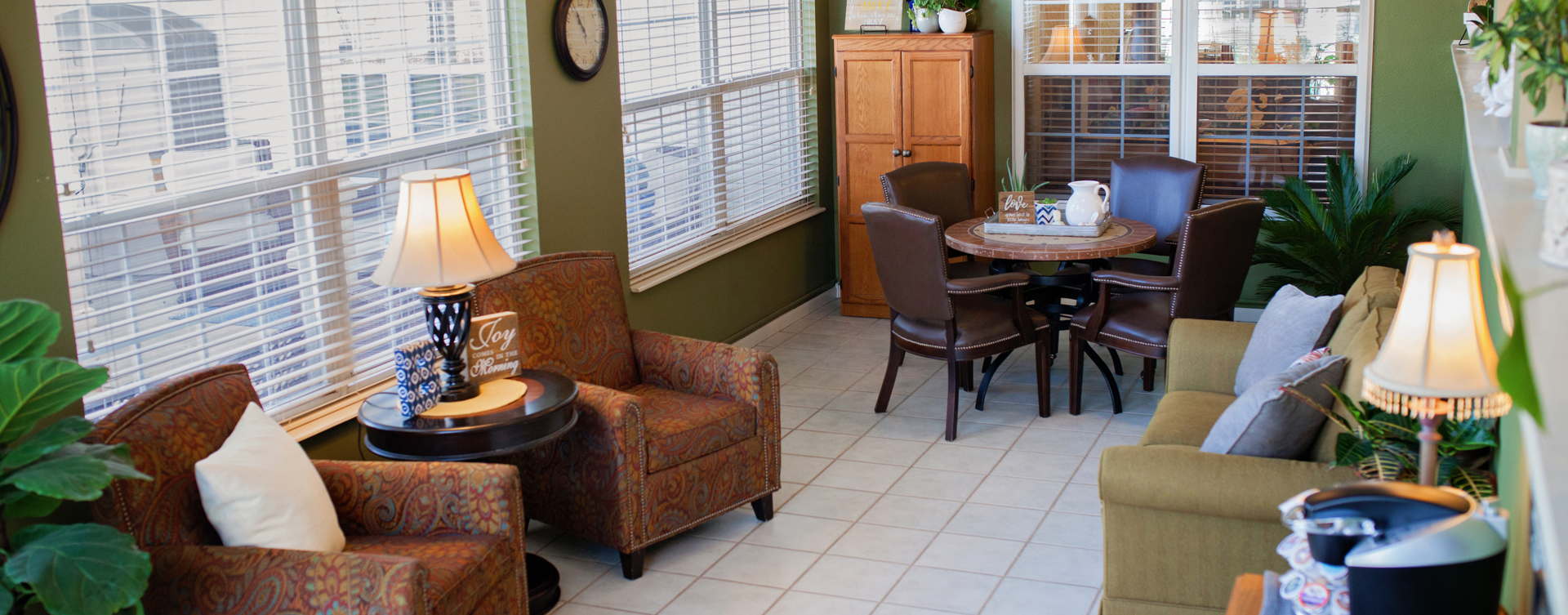 Relax in the warmth of the sunroom at Bickford of Marion