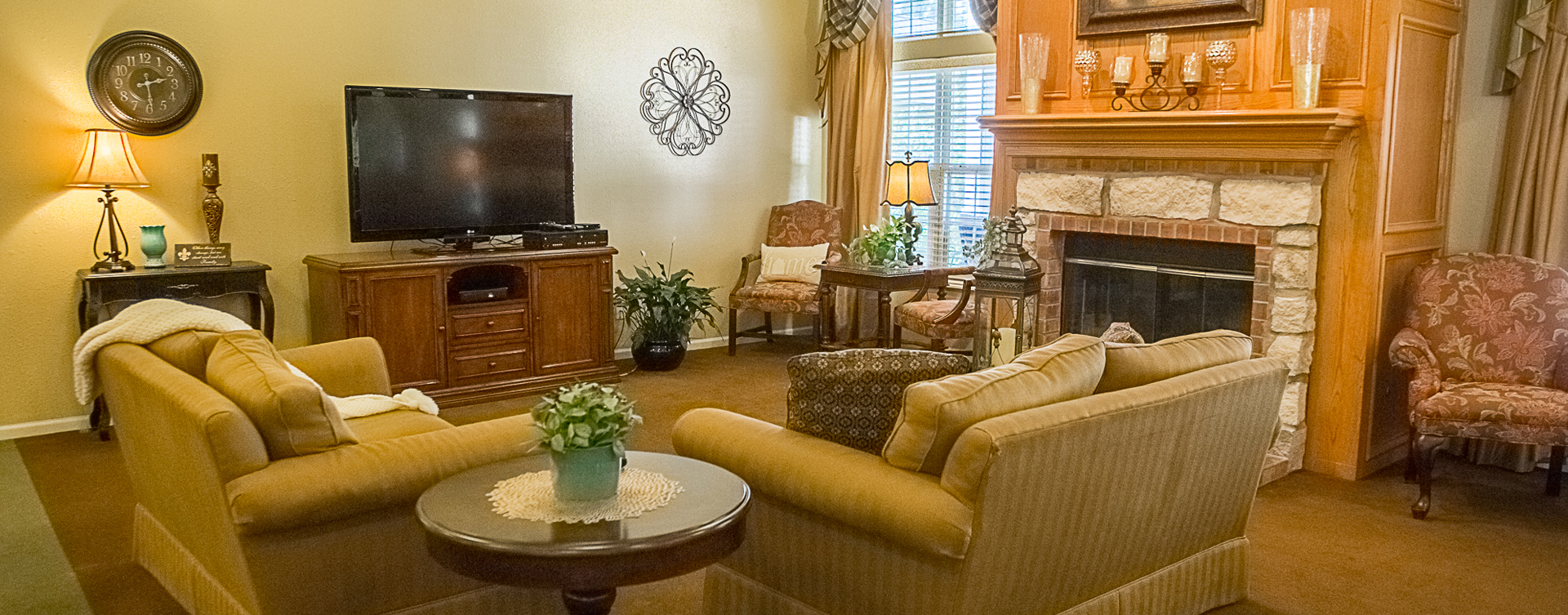 Enjoy a good book in the living room at Bickford of Muscatine