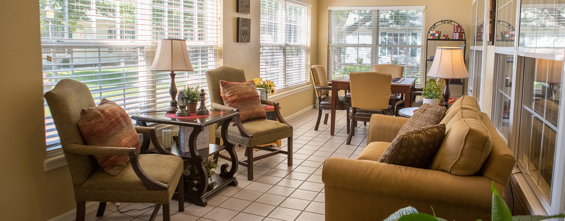 Enjoy the view of the outdoors from the sunroom at Bickford of Muscatine