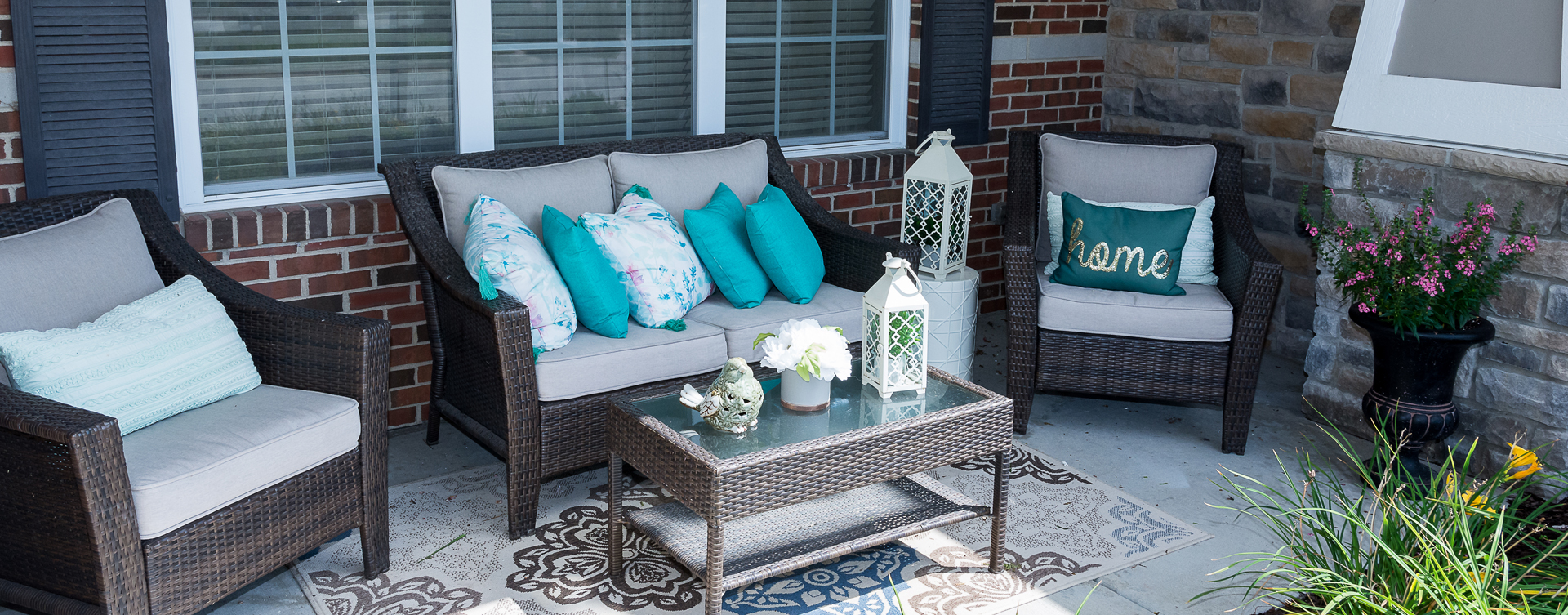 Enjoy conversations with friends on the porch at Bickford of Oswego