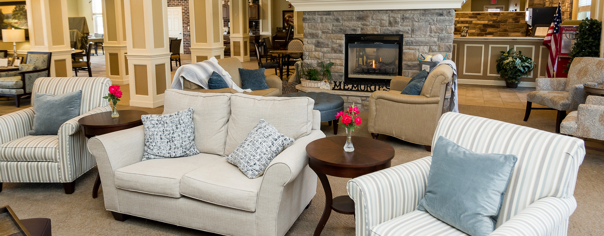 Socialize with friends in the living room at Bickford of Oswego