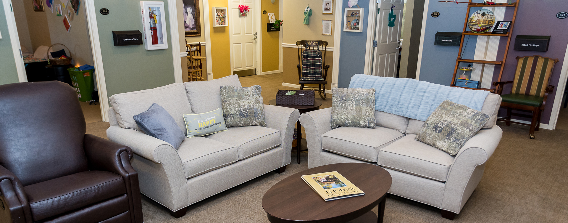 Residents can enjoy furniture covered in cozy fabrics in the Mary B’s living room at Bickford of Oswego