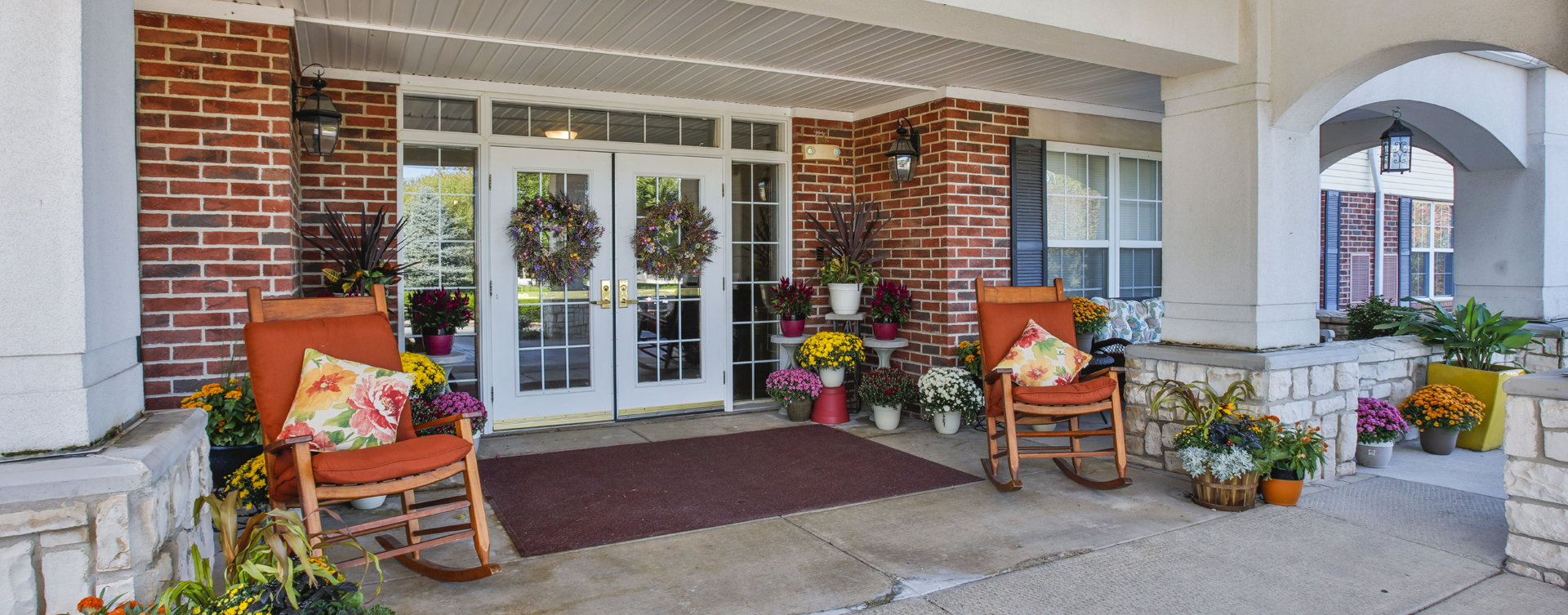 Sip on your favorite drink on the porch at Bickford of Peoria