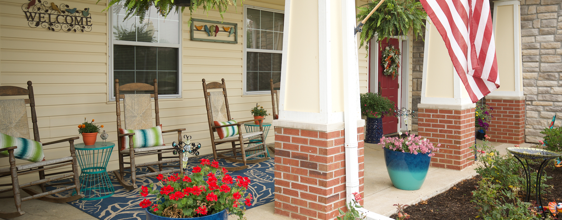 Relax in your favorite chair on the porch at Bickford of Quincy