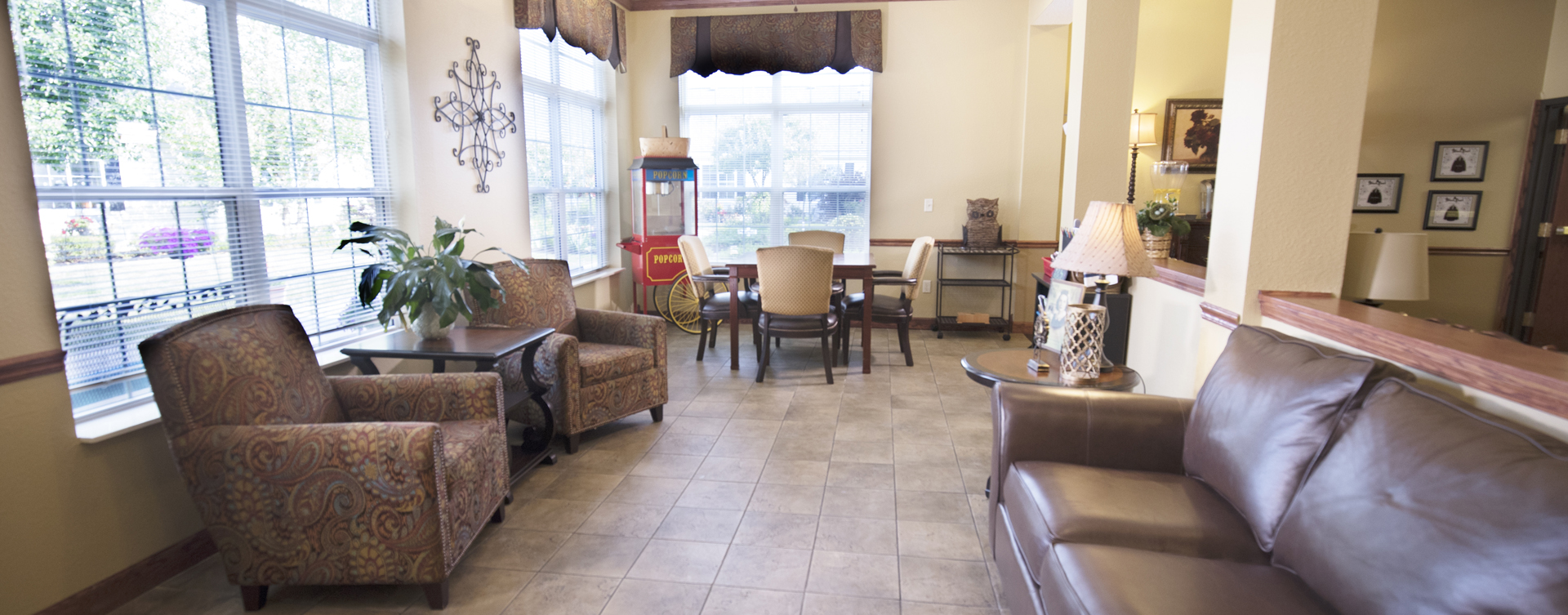 Relax in the warmth of the sunroom at Bickford of Quincy