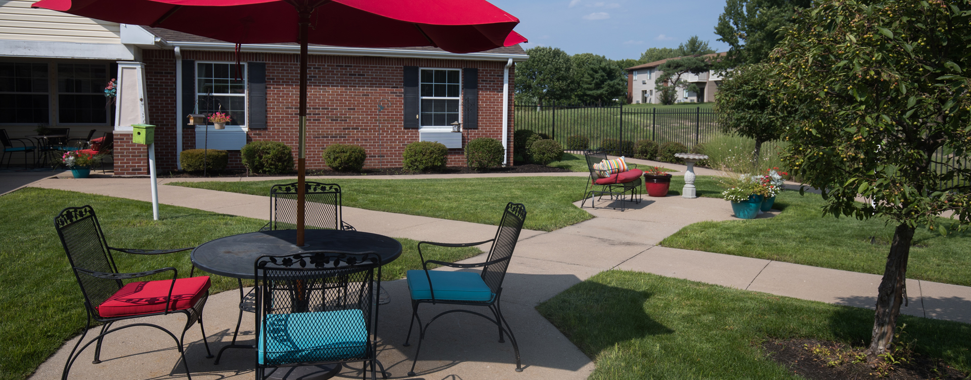 Residents with dementia can enjoy the outdoors by stepping into our secure courtyard at Bickford of Quincy