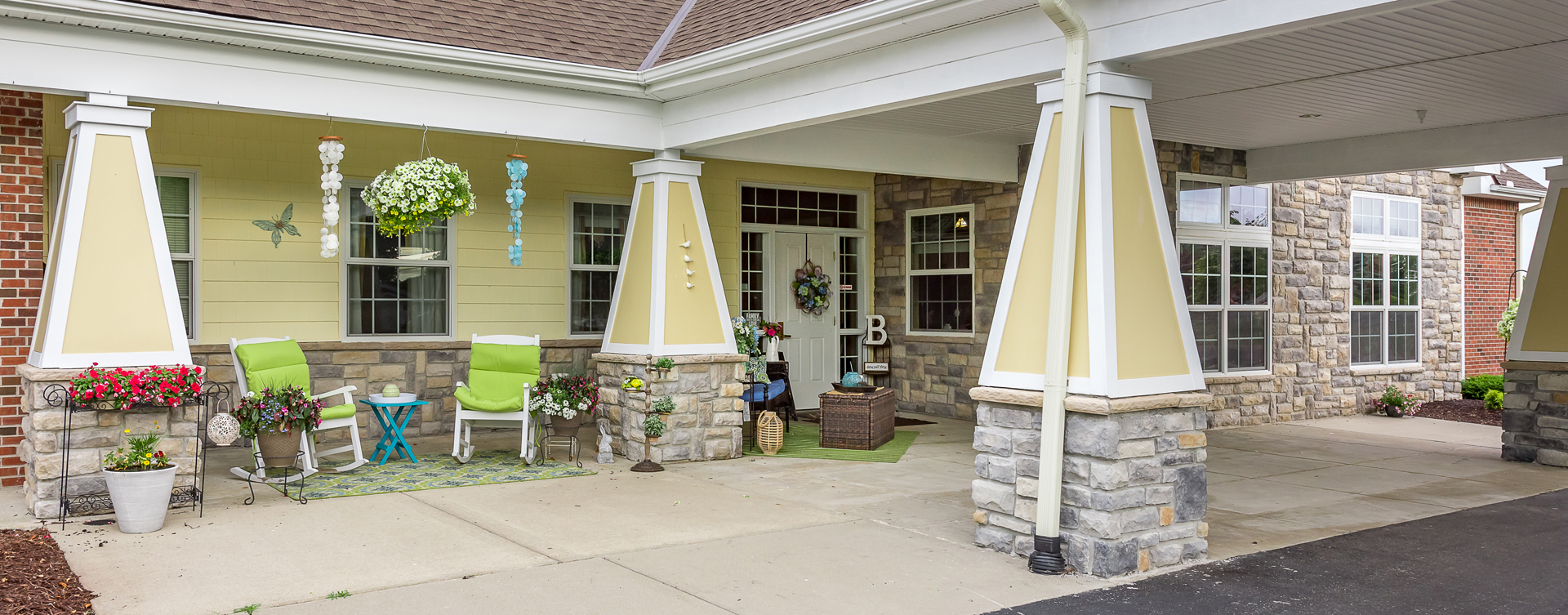 Enjoy conversations with friends on the porch at Bickford of Saginaw Township