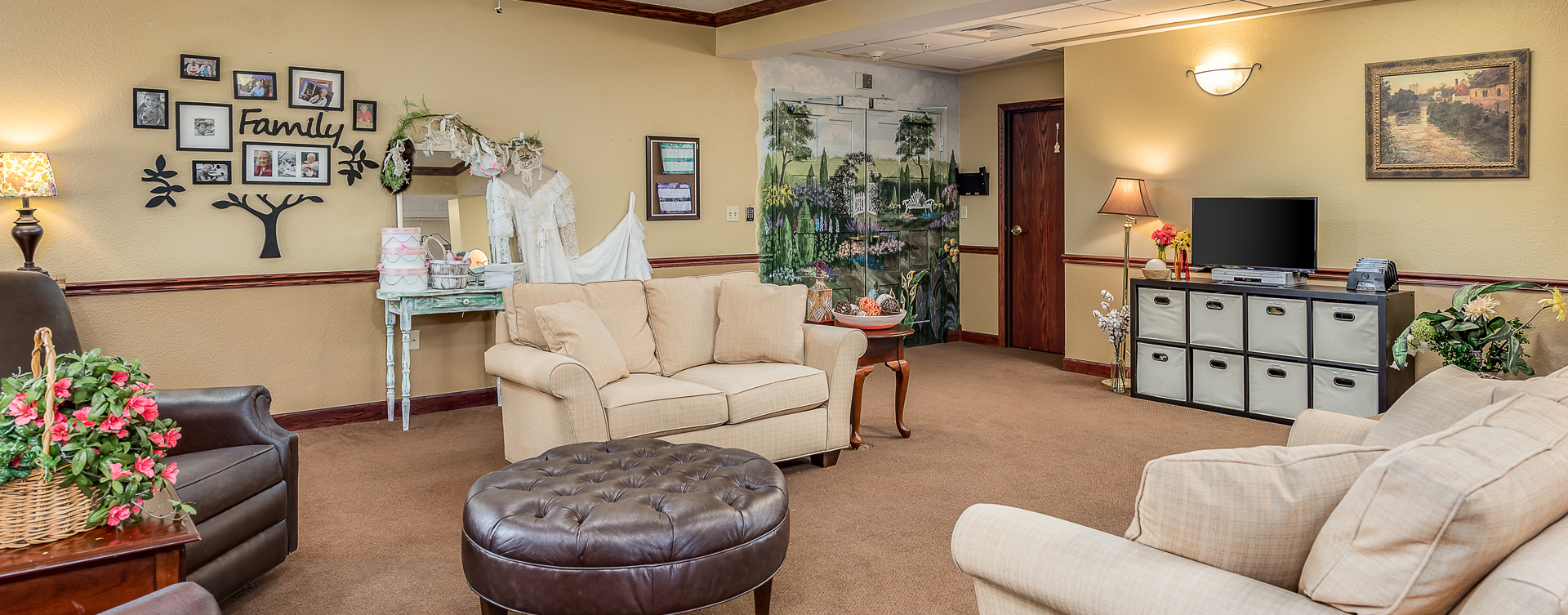 Residents can enjoy furniture covered in cozy fabrics in the Mary B’s living room at Bickford of Saginaw Township