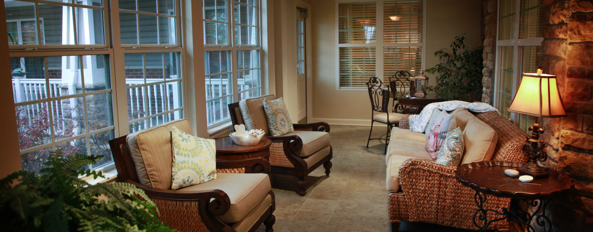 Relax in the warmth of the sunroom at Bickford of St. Charles