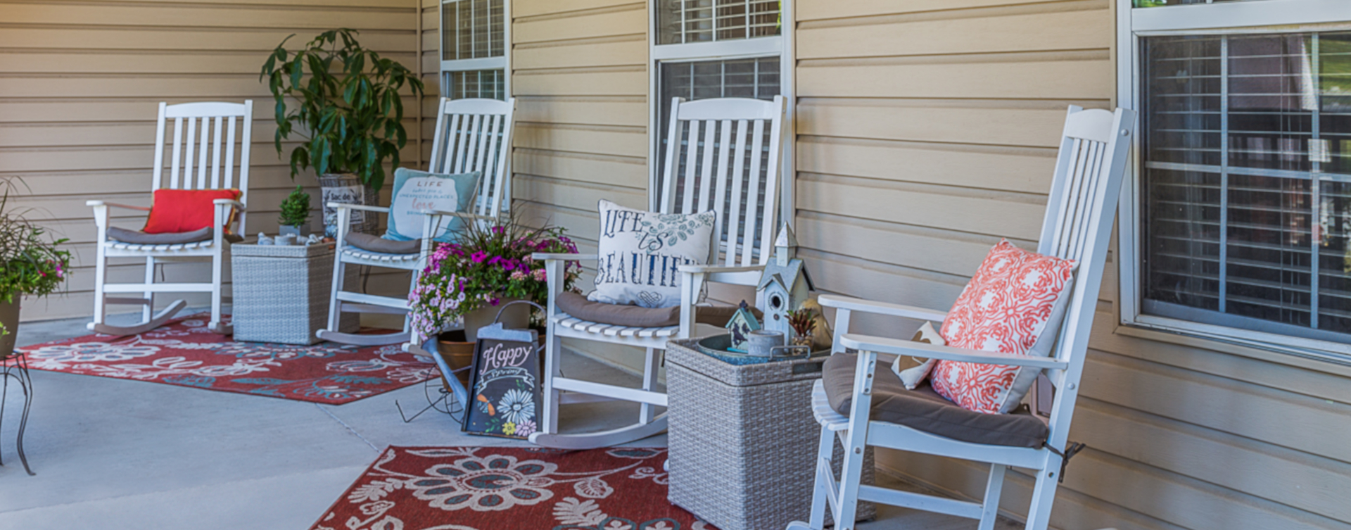Sip on your favorite drink on the porch at Bickford of Urbandale